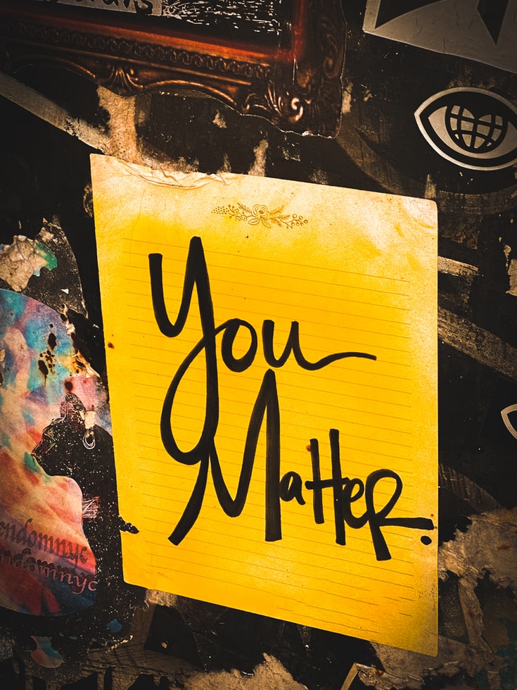 Yellow sign reading you matter 